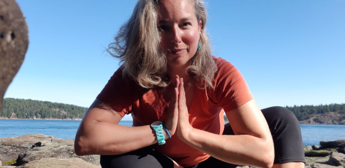 Meditating outdoors Marni Levitt meditating outdoors, radiating focus and inner inspiration.